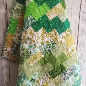 Made In Ireland Green baby/lap quilt quilted with green shamrocks