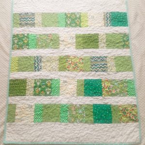 Green and white made in Ireland quilt (personalised)
